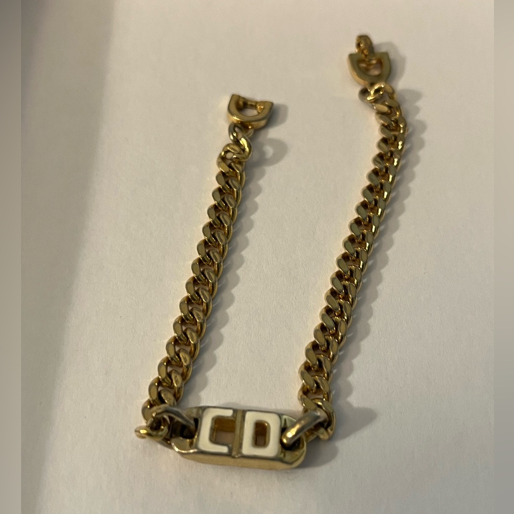 Christian Dior gold tone bracelet .